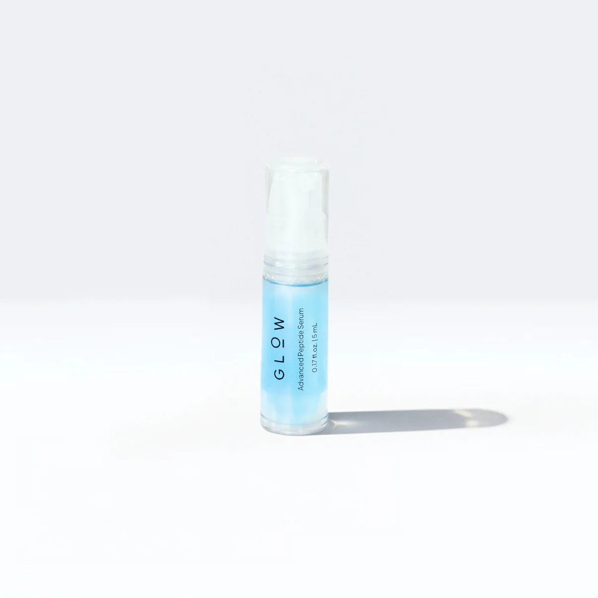 Glow peptide serum sample bottle with blue liquid
