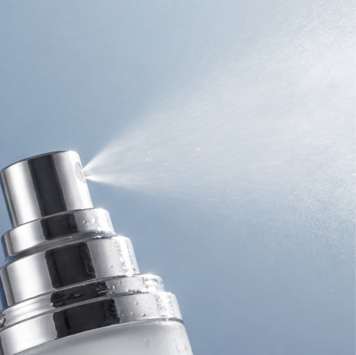 Fine mist application of DEFEND ceramide barrier spray for skin hydration and protection